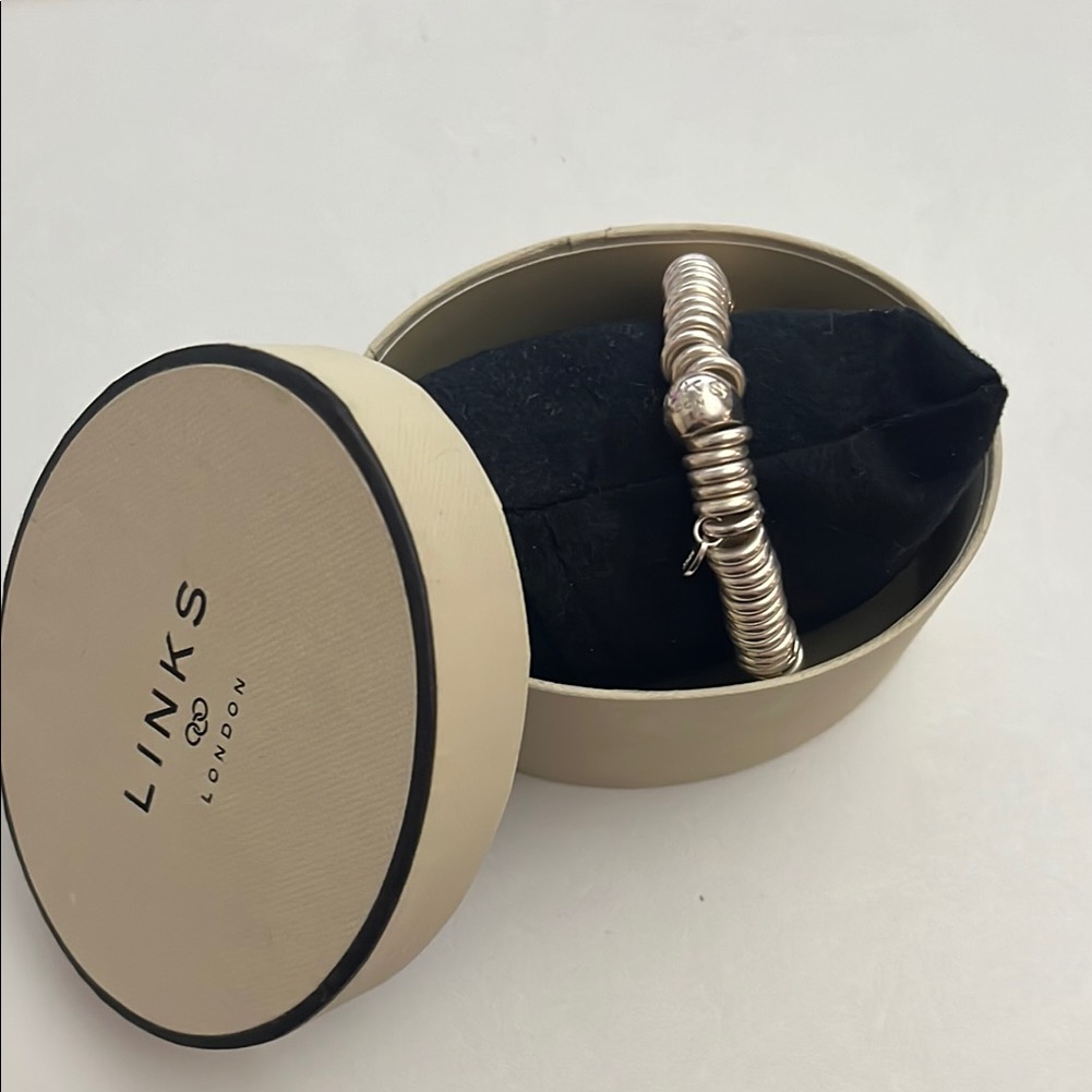 Silver Coil Bracelet 450$